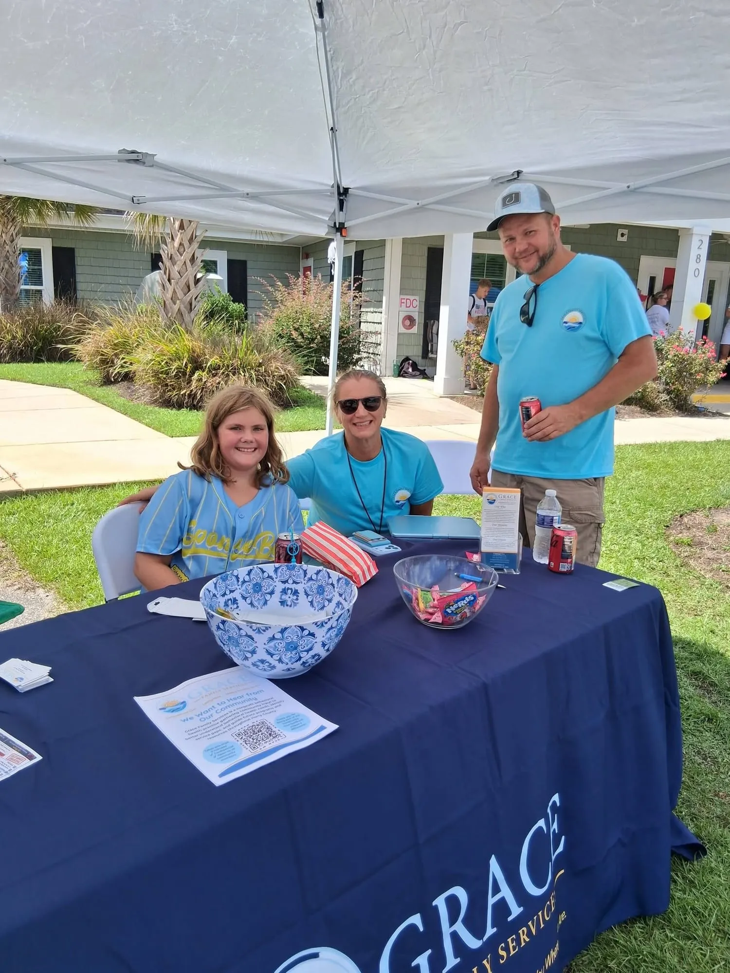 Grace Family Services team members at a community outreach table