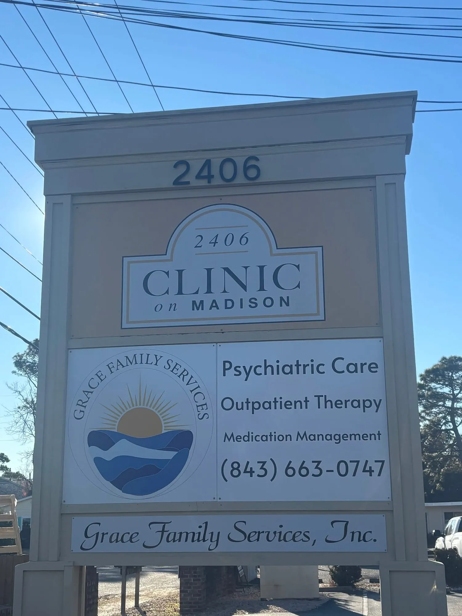 The Clinic on Madison street sign listing Grace Family Services, Inc.
